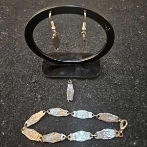 Earrings, pendent and bracelet set.